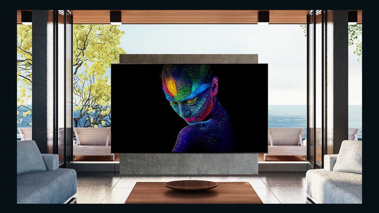 Samsung TV against a glass window.