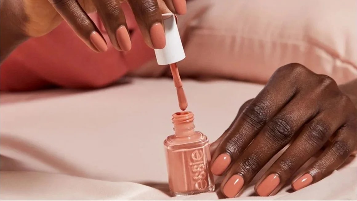 Woman painting her nails