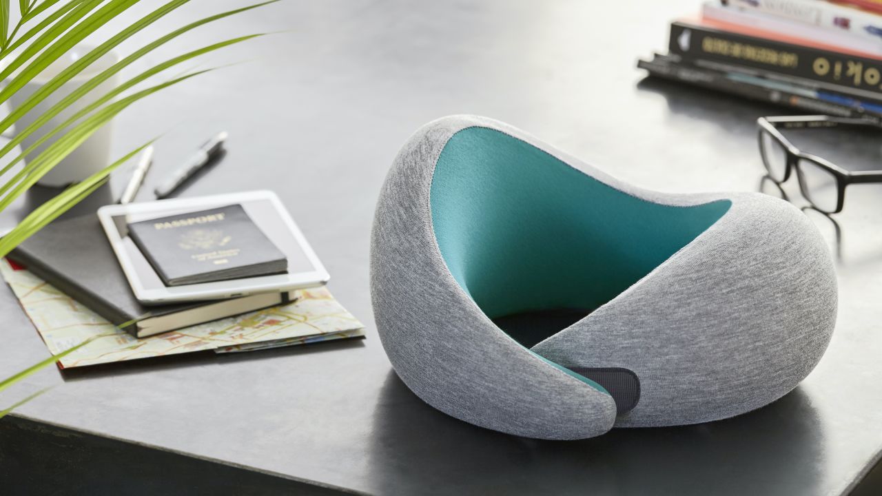 The Ostrichpillow sitting atop a desk.