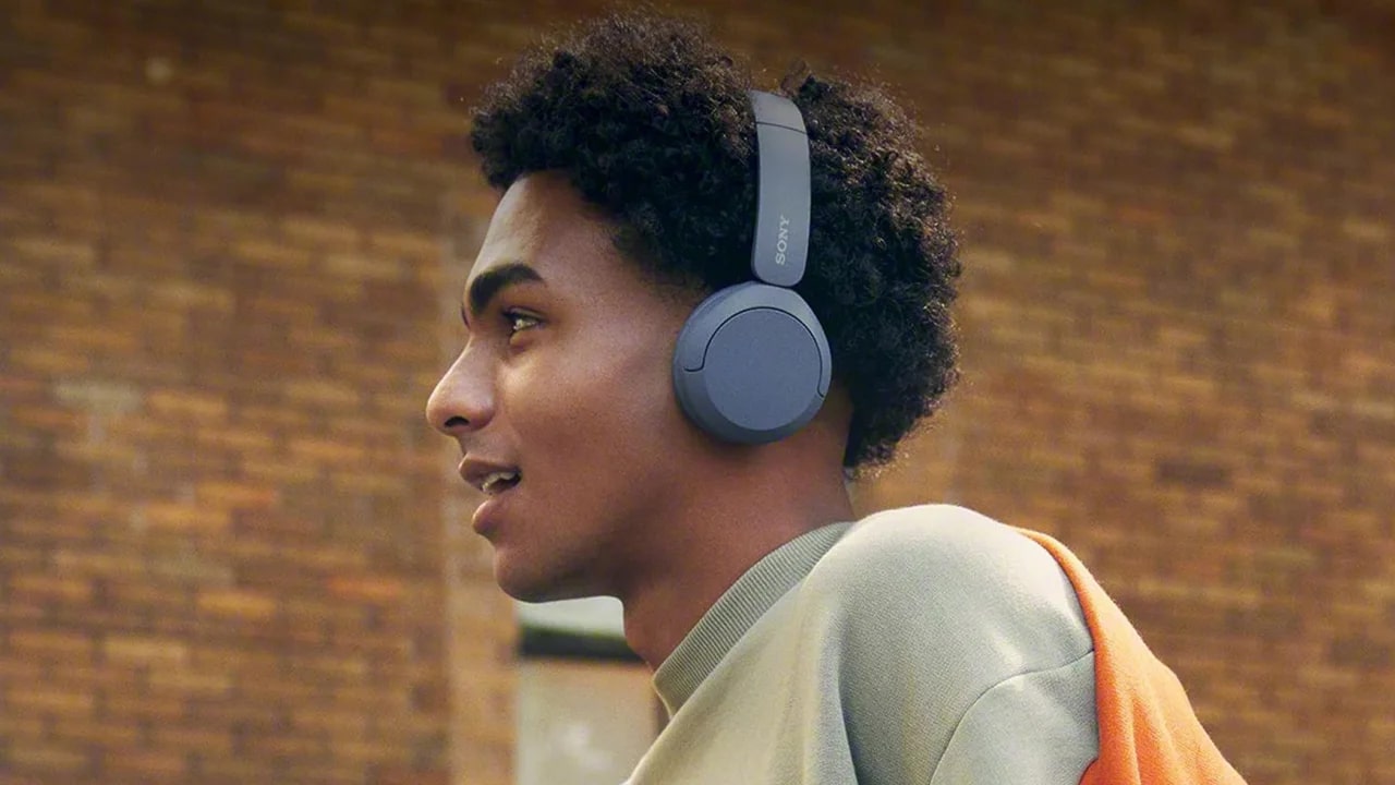 Teen wearing over-the-ear headphones