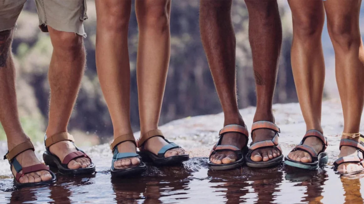 Four people wearing sandals